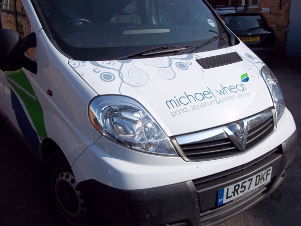 Sign makers vehicle graphics for Michael Wheat